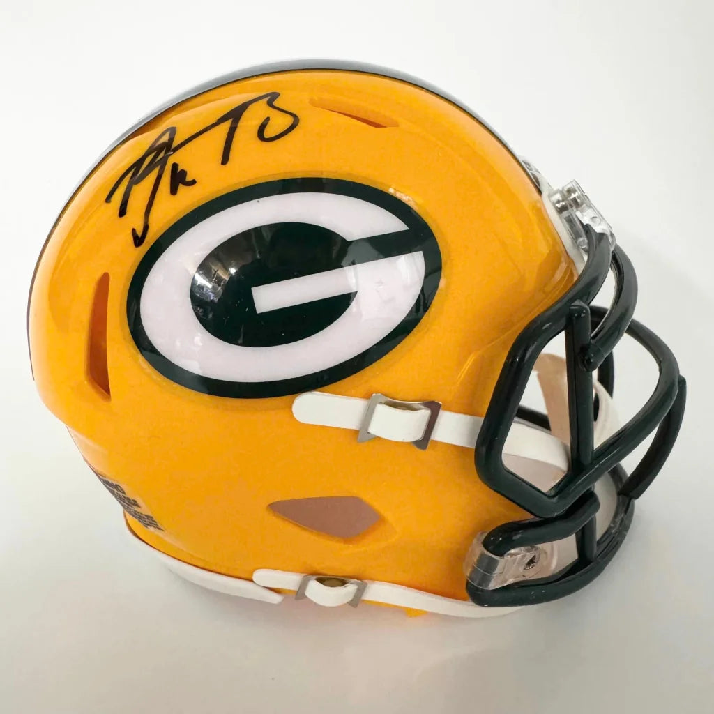 Green Bay Packers mini football helmet with signature and authentication badge