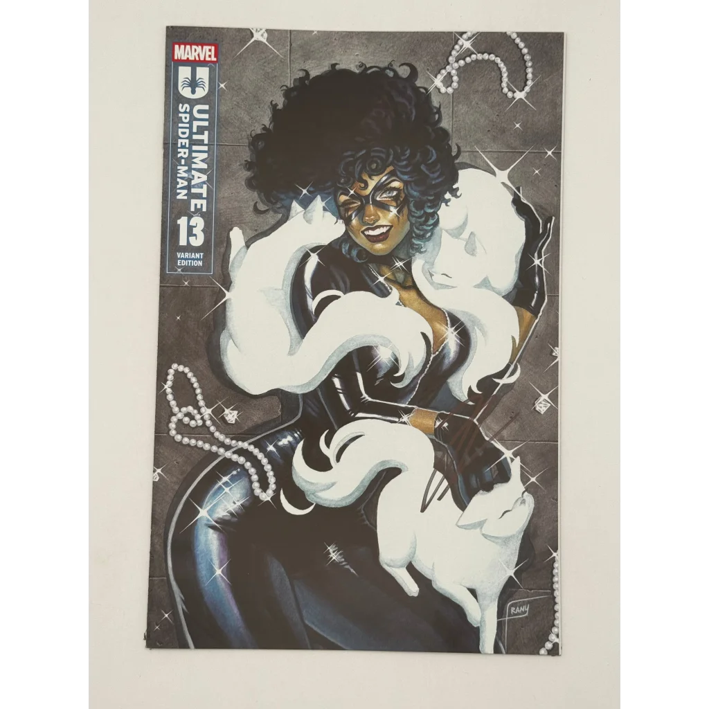 Comic book with female hero, dark curly hair, white cats, signed by Jonathan Hickman