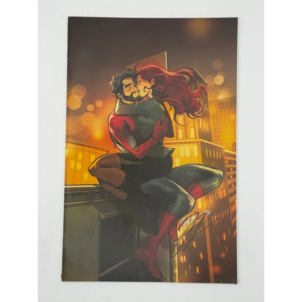 Colorful Ultimate Spider-Man comic cover with two characters hugging on a rooftop, signed by Jonathan Hickman