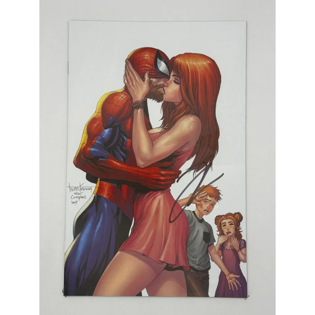 Jonathan Hickman signed Ultimate Spider-Man comic cover with Spider-Man kissing Mary Jane and kids