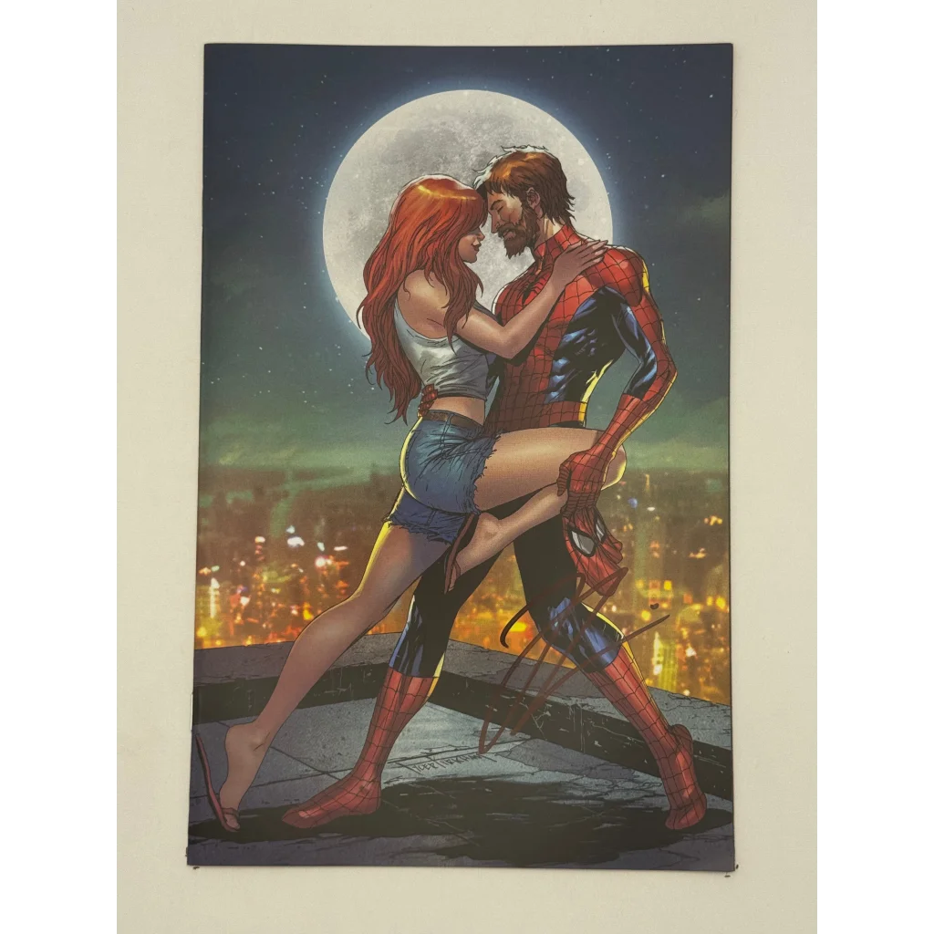 Ultimate Spider-Man comic with Spider-Man and Mary Jane under moon, signed by Jonathan Hickman and Marco Checchetto