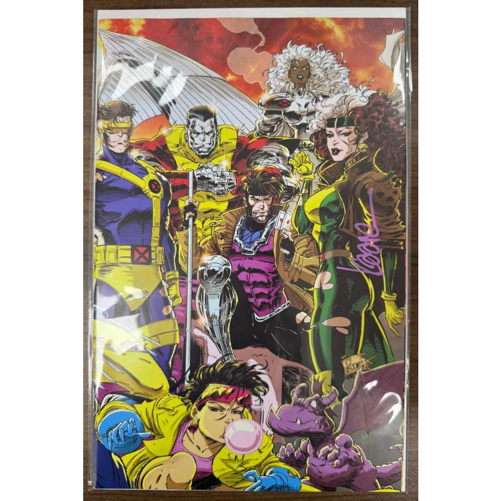 Vibrant Kaare Andrews X-Men comic cover with Cyclops, Storm, Rogue in plastic sleeve