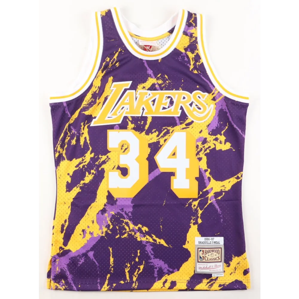 Signed Lakers jersey featuring Shaquille O Neal in purple and yellow Lakers jersey