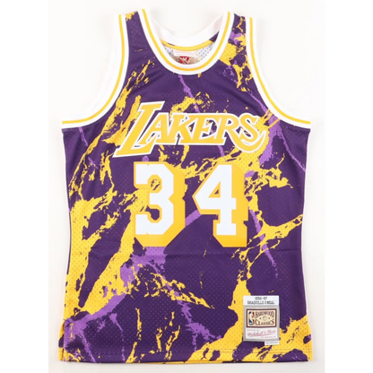 Signed Lakers jersey featuring Shaquille O Neal in purple and yellow Lakers jersey