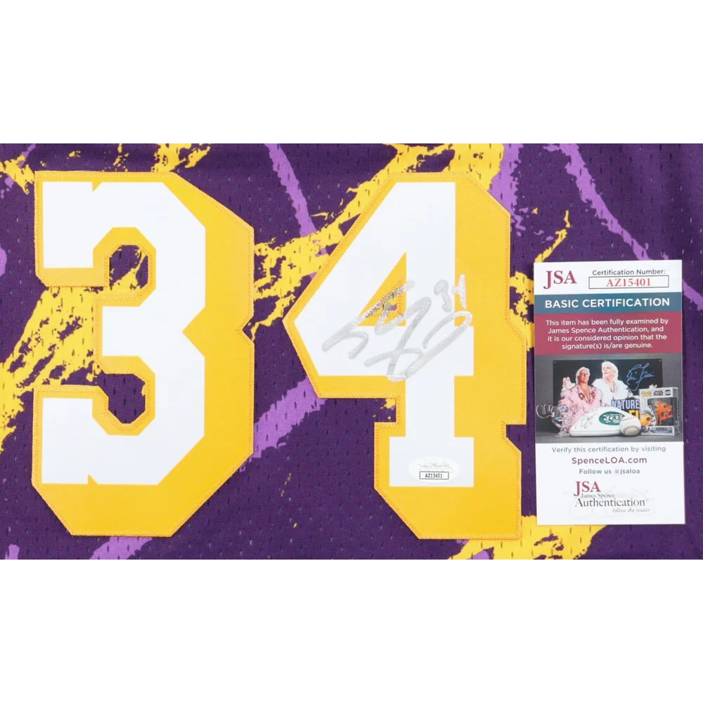 Signed Lakers jersey Shaquille O’Neal with JSA cert, purple and yellow, numbered 34