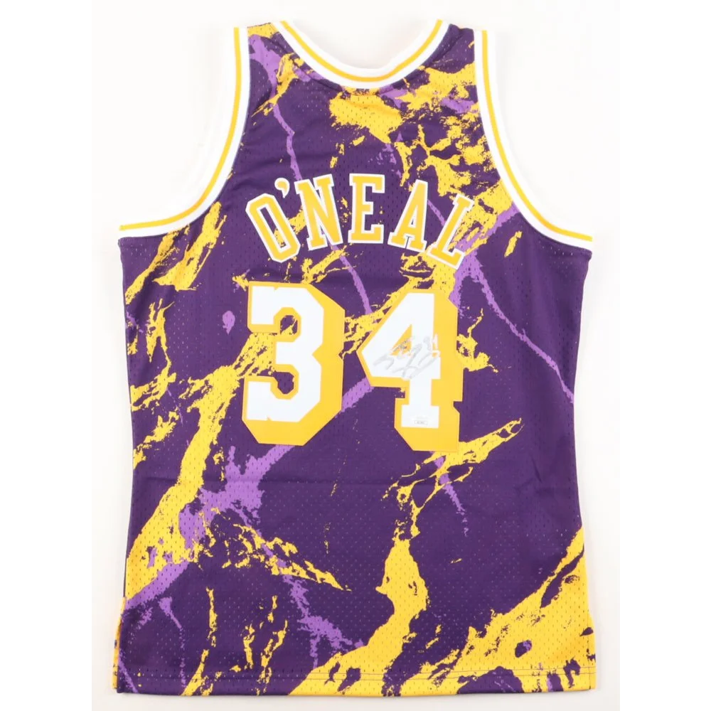 Purple and yellow signed Lakers jersey Shaquille O’Neal collectible with autograph