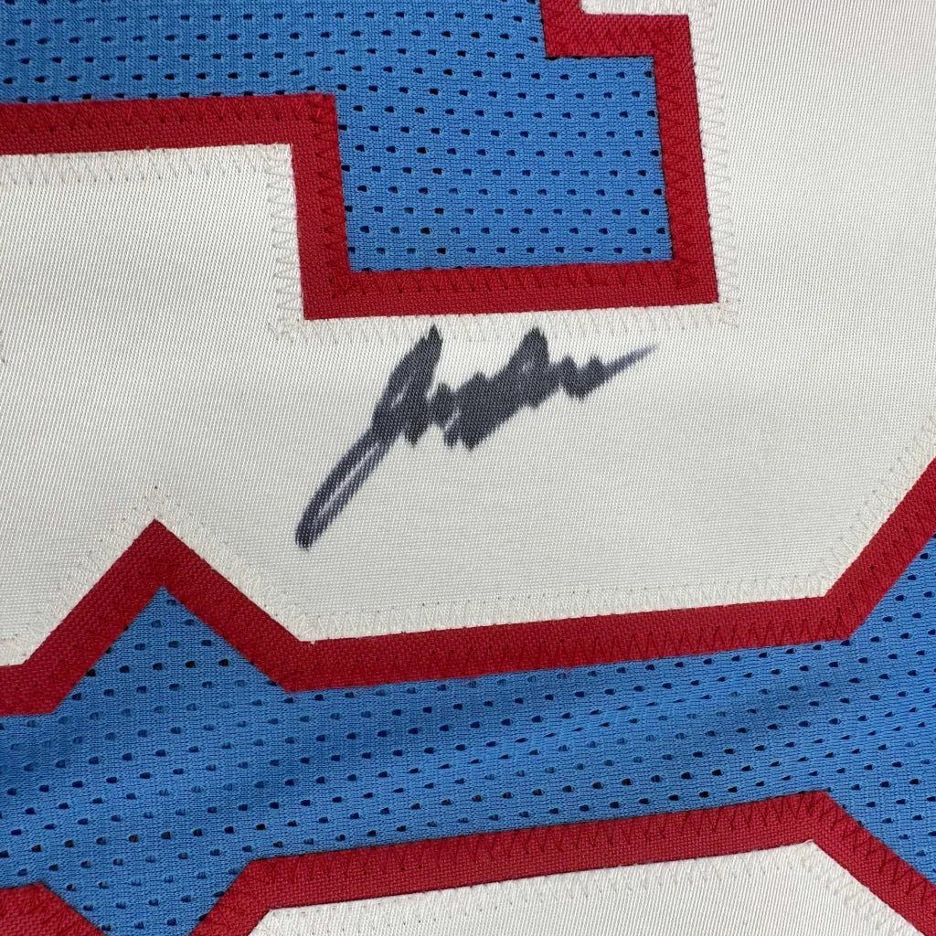 Autographed blue and white Chiefs jersey with red trim and action photos ready to hang