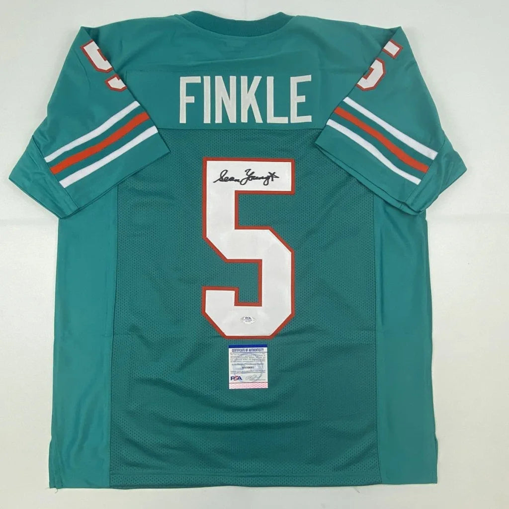 Signed Miami Dolphins custom green jersey with number 5, perfect for sports fans