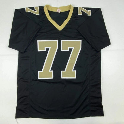 Signed Roaf custom black and gold football jersey with number 77 for sports fans