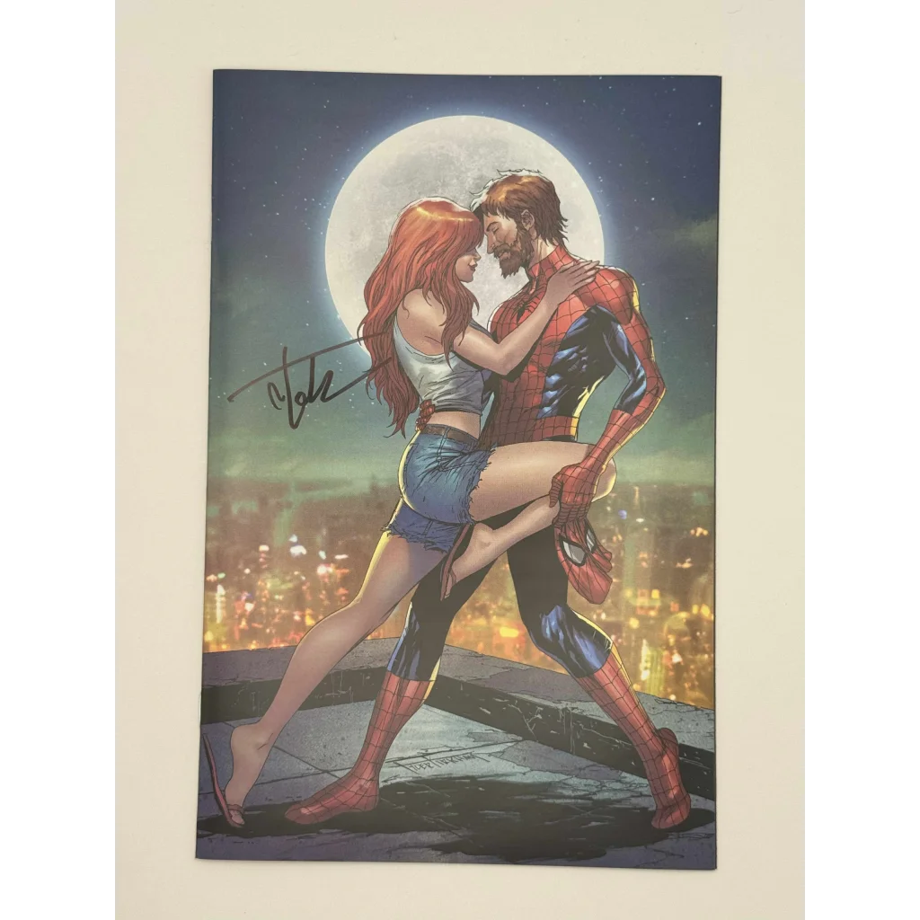 Signed Tyler Kirkham Ultimate Spider-Man comic book with Spider-Man and Mary Jane rooftop cover