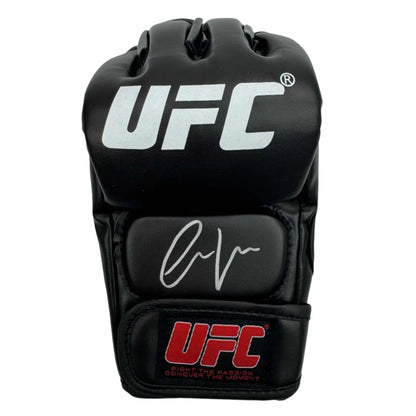 Signed black UFC boxing glove with signature on palm and wrist strap