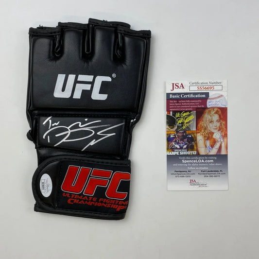 Black UFC glove with red and white logo and signature on palm with JSA card