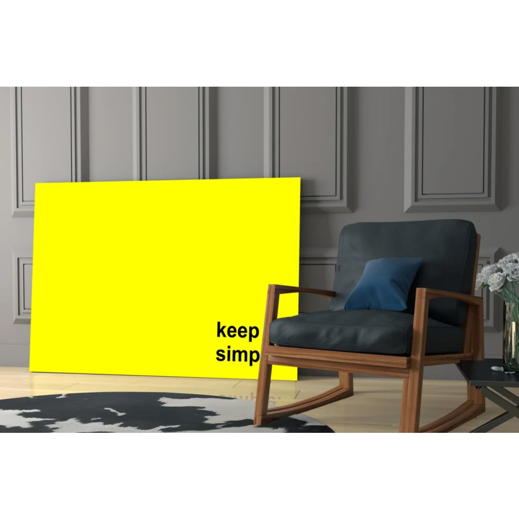 Bright yellow Keep It Simple canvas wall art print on gray wall