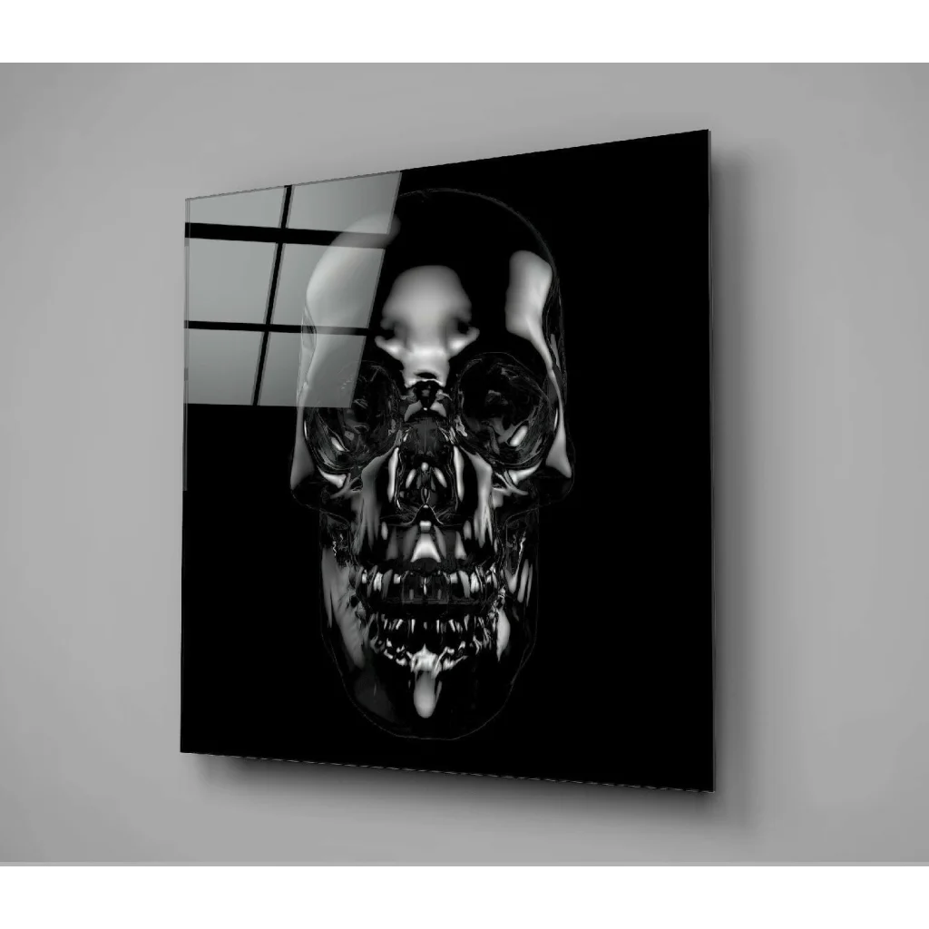 Glossy black skull glass wall art panel mounted on wall