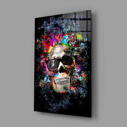 Vibrant graffiti skull in black sunglasses on neon glass wall art with color splashes