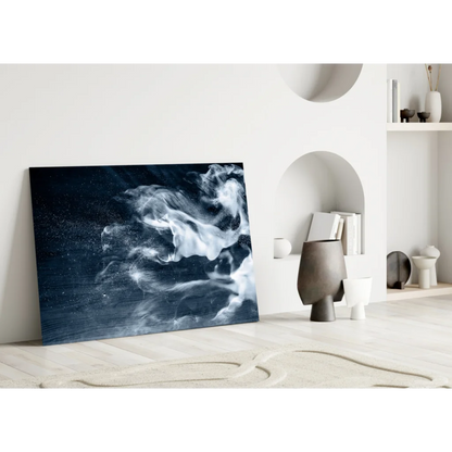 Modern glass wall art print with swirling white and gray smoke patterns on navy blue