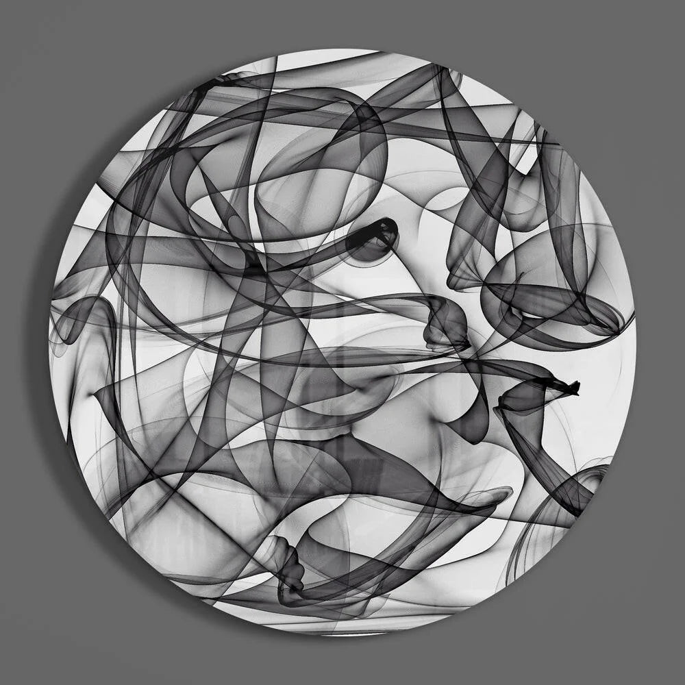 Swirling black and white tempered glass art with size comparison