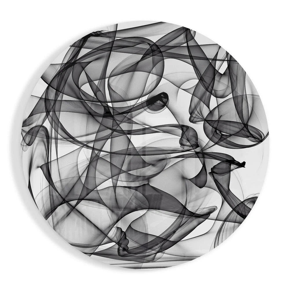 Swirling black and white tempered glass art with size comparison