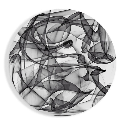 Swirling black and white tempered glass art with size comparison