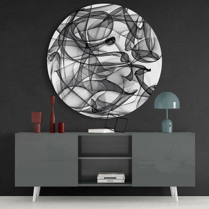 Swirling black and white tempered glass art with size comparison