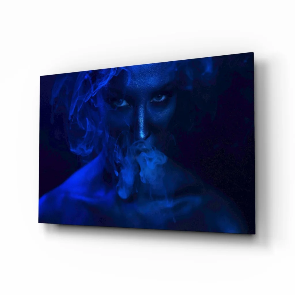 Blue-toned ethereal smoke portrait canvas wall art on white wall