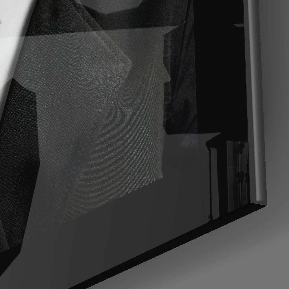 Modern black framed glass wall art with abstract geometric shapes