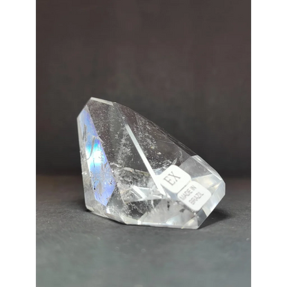 Smoky clear quartz polished free form sculpture with clear quartz polished facets and subtle blue iridescent sheen