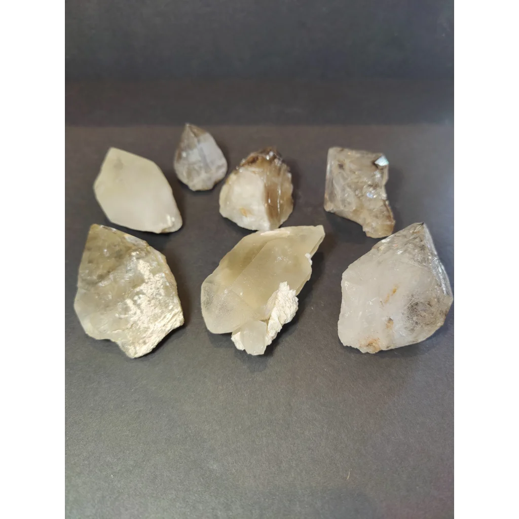 Smoky quartz natural elestial points featuring clear quartz natural crystals with jagged edges and subtle brown inclusions