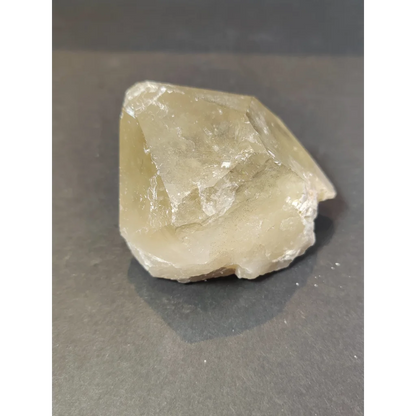Smoky quartz natural elestial points with pale yellowish-white translucent color and rough faceted surface crystalline structure