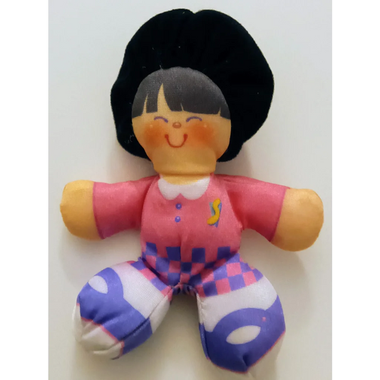 Cute Smooshees Cuddler Cuties Patty Dines Out plush doll in pink purple checkered with black hair and smiling face