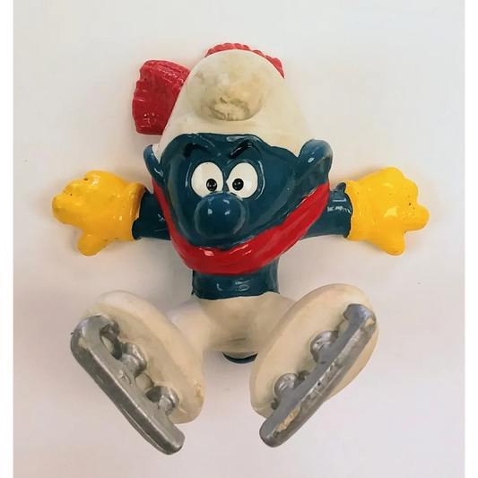 Vintage 1979 Ice Skater Smurf toy with red scarf and yellow boots