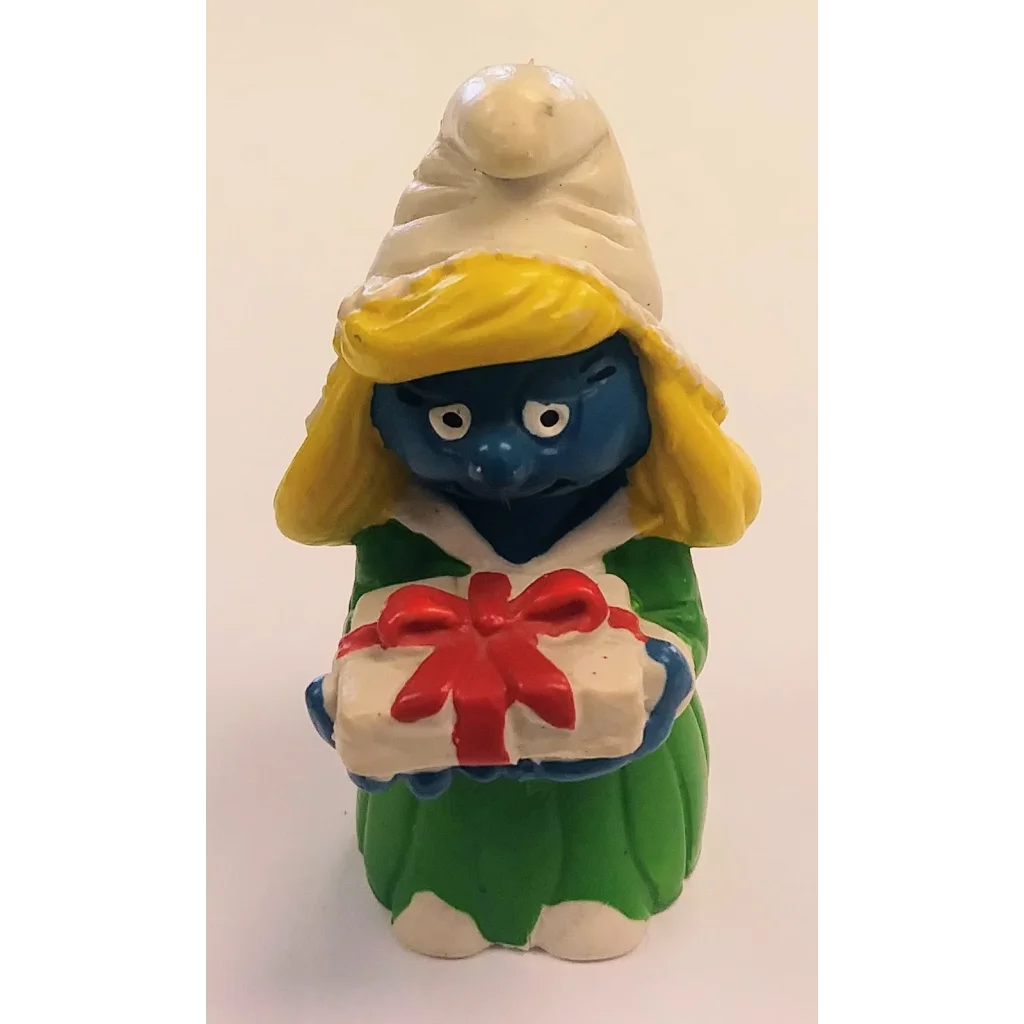 Vintage 1984 Christmas Smurfette figurine holding gift box