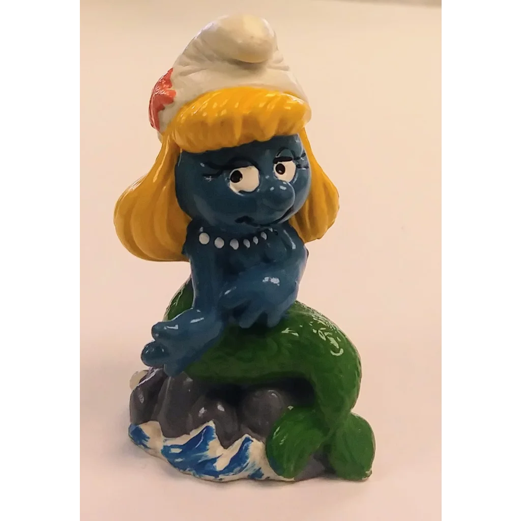 Rare 1981 Mermaid Smurfette Peyo Schleich figurine with yellow hair, blue skin, green tail