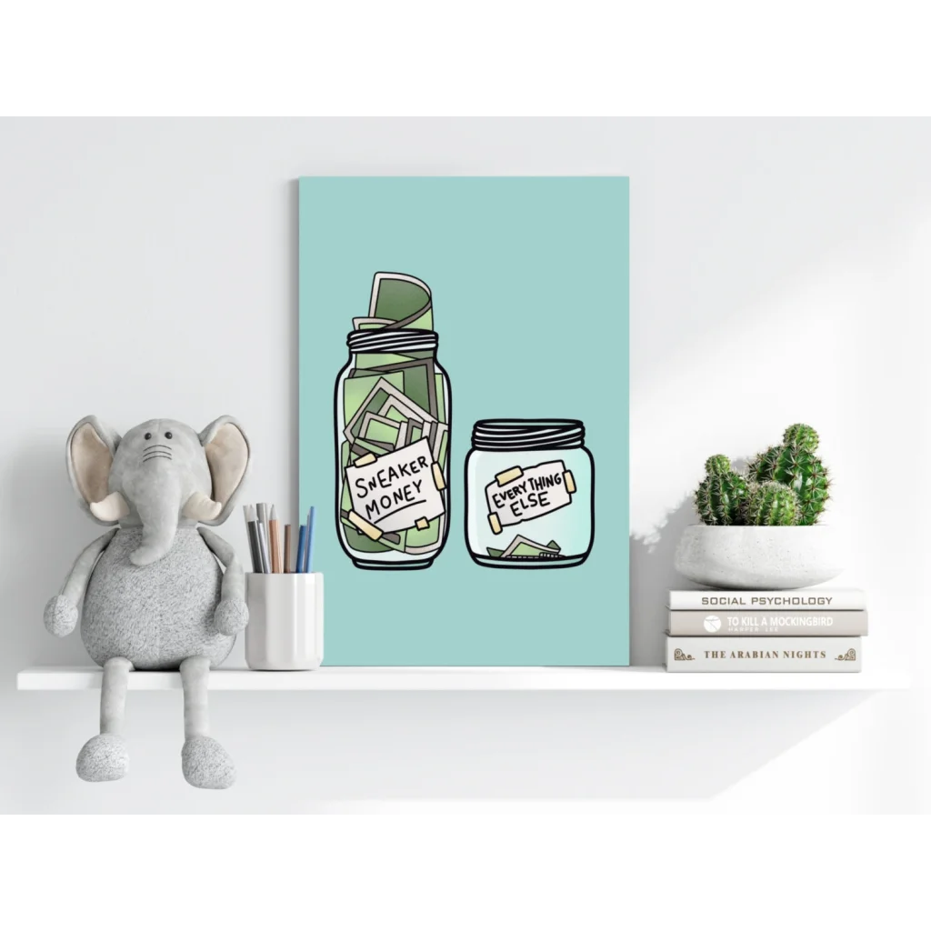 Cute elephant plush toy with gray fur and white tusks on shelf