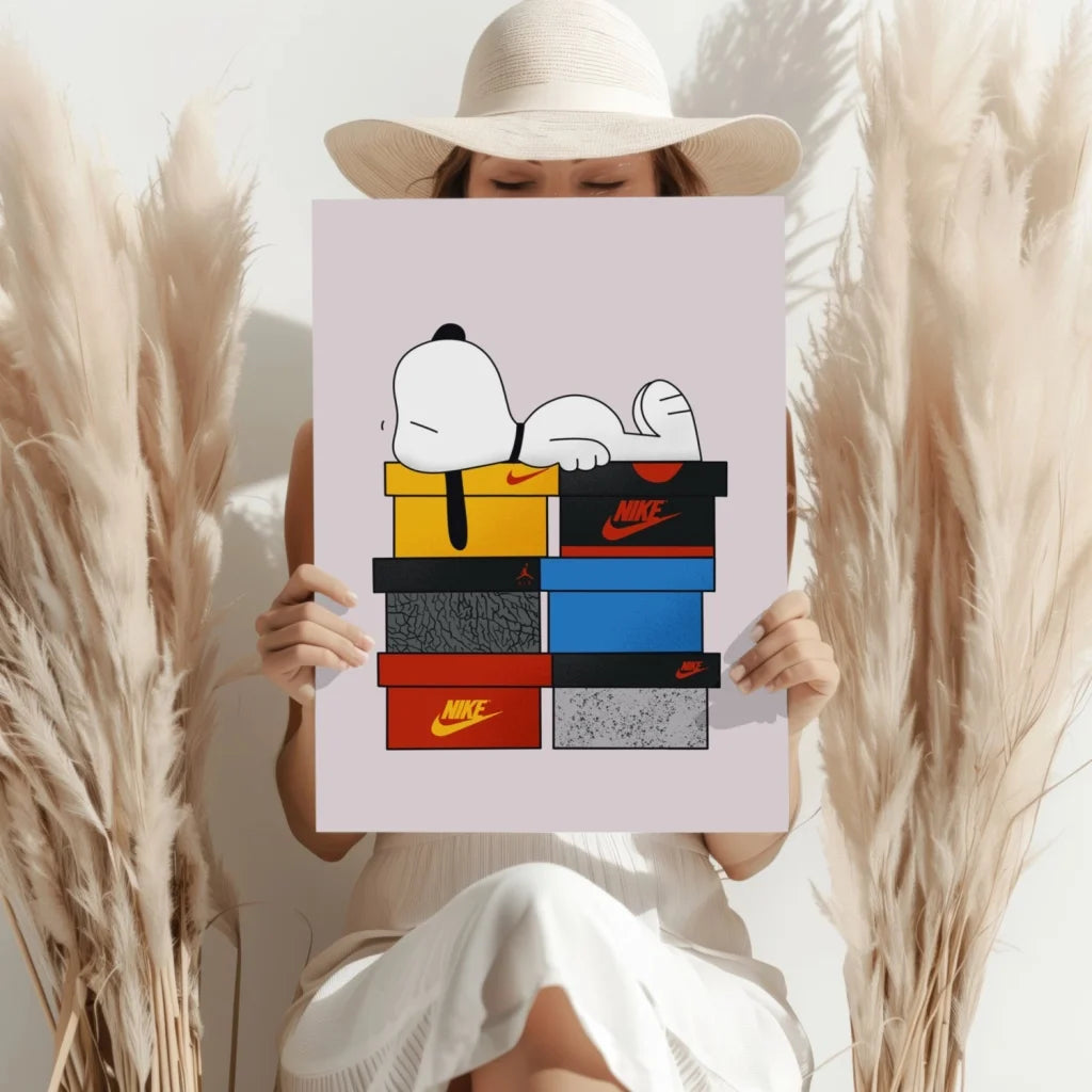 Cartoon Snoopy atop colorful Nike shoe boxes on insigne aluminum print