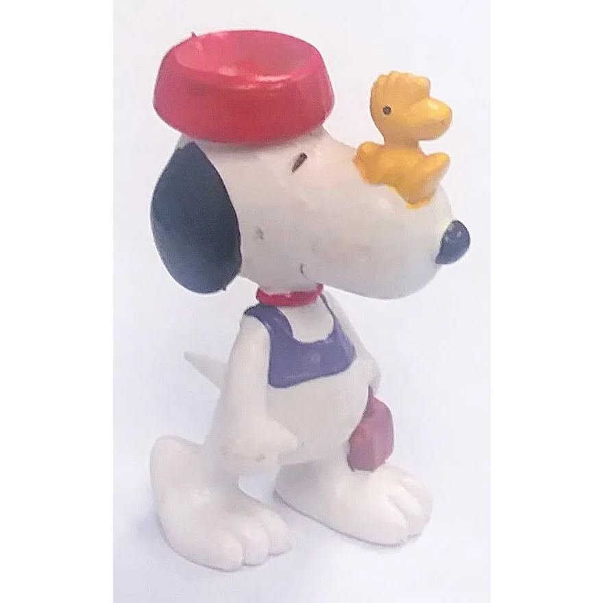 Cute Snoopy PVC figure with red hat and yellow duck toy