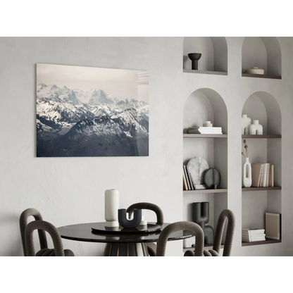 Framed black-and-white snow-capped mountains glass wall art on white wall