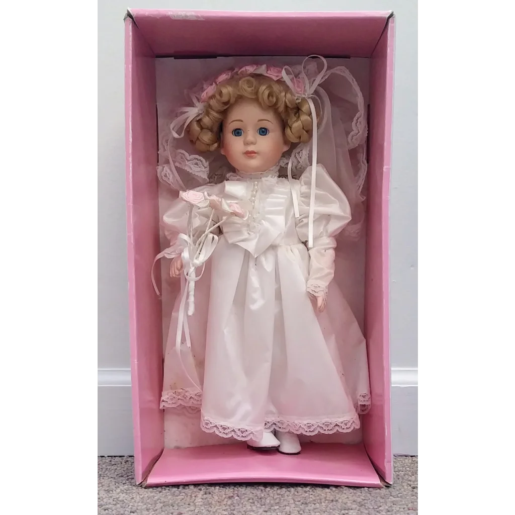 Soft Expression Porcelain Bride Doll in white lace dress with pink ribbon
