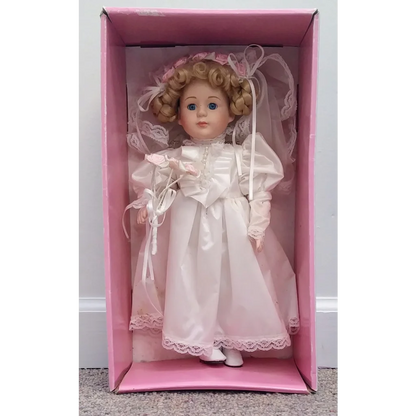 Soft Expression Porcelain Bride Doll in white lace dress with pink ribbon