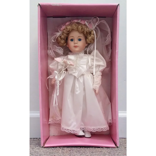 Soft Expression Porcelain Bride Doll in white lace dress with pink ribbon