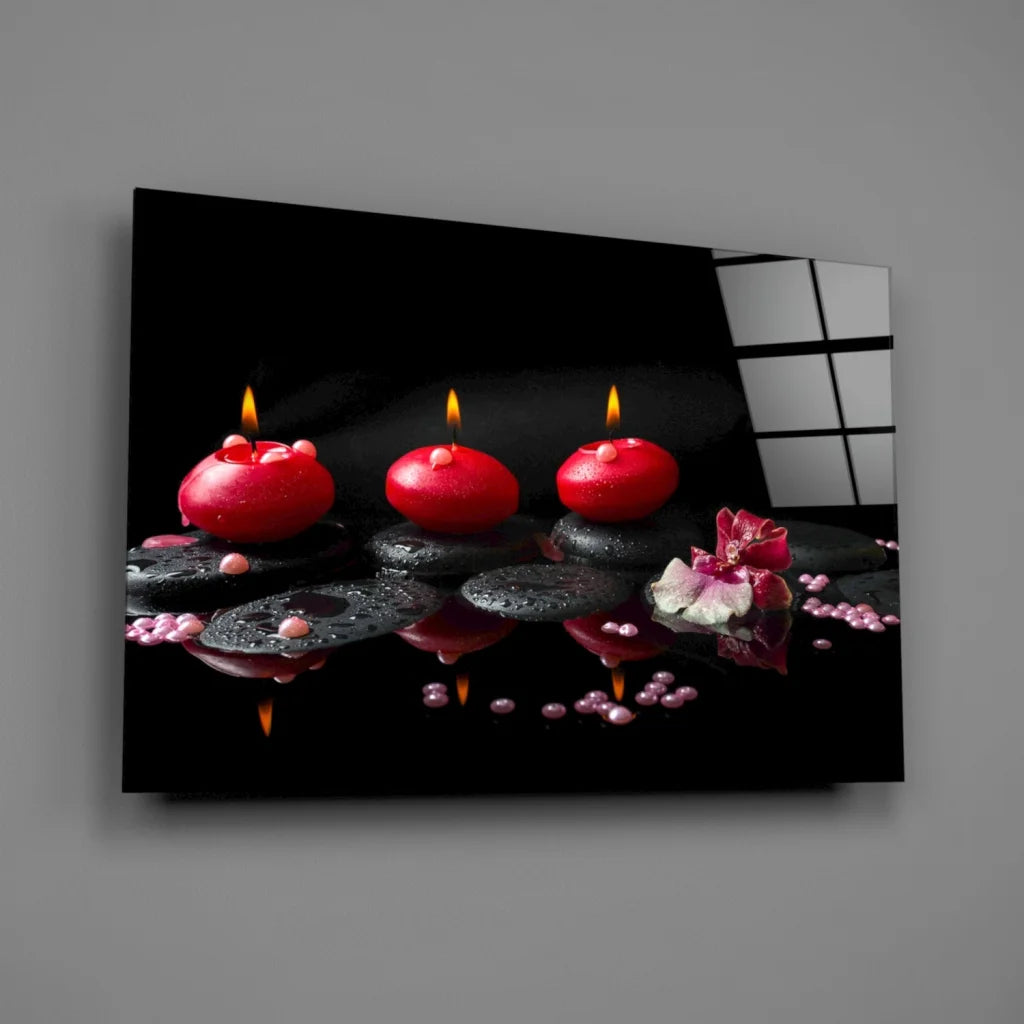 Glowing red candles glass wall art with pink flowers on dark stones