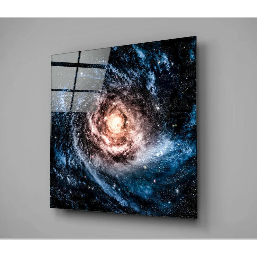 Vibrant spiral galaxy glass wall art in blues and golds