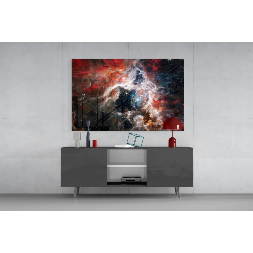 Vibrant cosmic nebula glass wall art in reds, oranges, blues on dark space