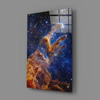 Vibrant cosmic nebula glass wall art with swirling orange and blue hues