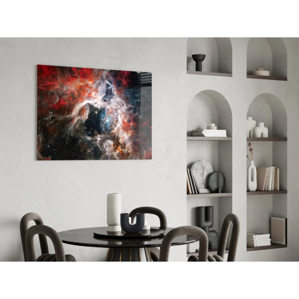 Vibrant red orange blue nebula glass wall art on sleek white wall