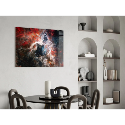 Vibrant red orange blue nebula glass wall art on sleek white wall
