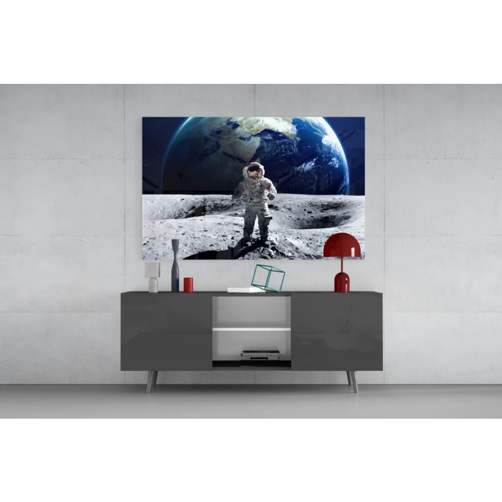 Sleek gray console table under Astronaut Moon Landing wall art