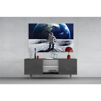 Sleek gray console table under Astronaut Moon Landing wall art