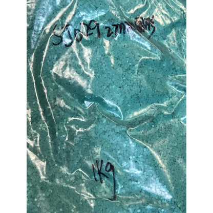 Teal-colored plastic pellets in Sparkly Light Pink F321R Glitter Collection Pink 2mm bag