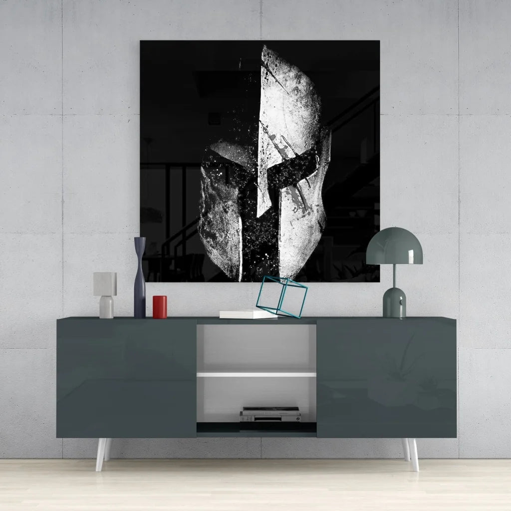 Bold black and white Spartan helmet tempered glass art on gray console